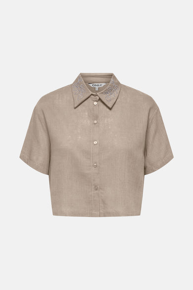 Chemise beige à manches courtes de ONLY, avec une élégante col et boutons.