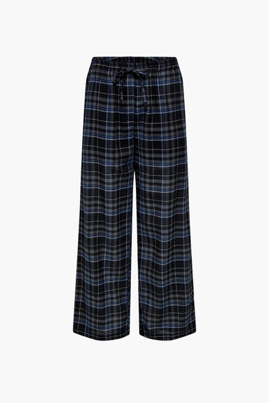 Pantalon bleu ONLY avec un motif à carreaux en noir, gris et bleu, vu de l'arrière.