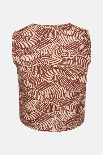 Mouwtje met bruine en beige bladprint.