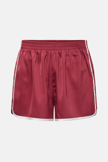 Short rouge ONLY avec des rayures blanches le long côt côtés et une ceinture élastique.