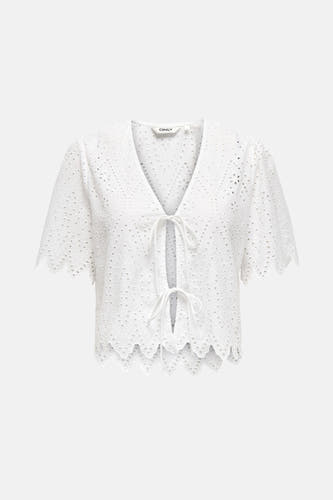 Blouse blanche à manches courtes de ONLY, avec des détails brodés et une fermeture éclair.