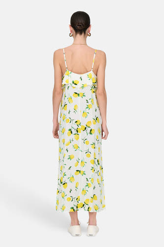 Robe sans manches JDY en blanc, avec imprimé citron et détails de bijoux dorés.