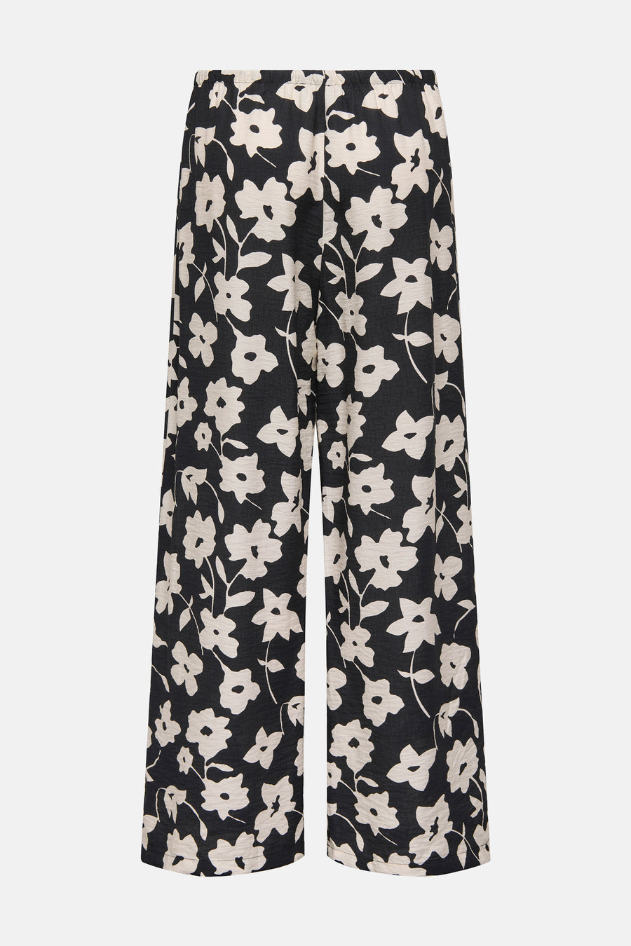 Zwarte broek met gebloemde print.
