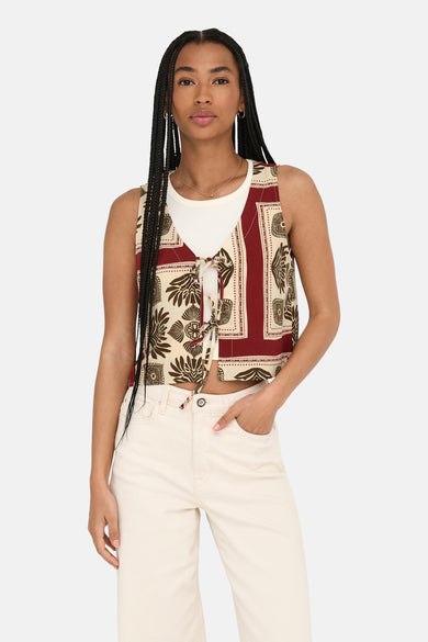 Blouse multicolore sans manches de ONLY, avec des motifs de fleurs bruns et une fermeture à glissière.
