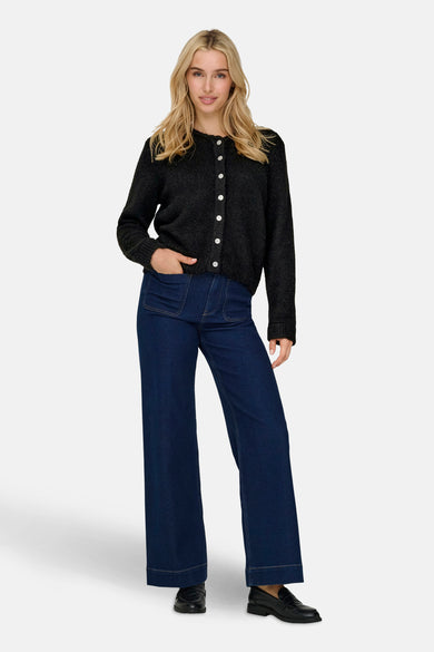 Cardigan noir d'ONLY, avec des manches longues et des boutons blancs.