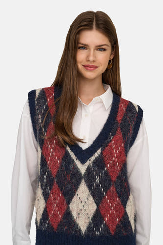 Veste sans col bleue d'ONLY, avec un motif de lunettes en rouge, blanc et bleu marine, portée sur une chemise blanche à manches longues.