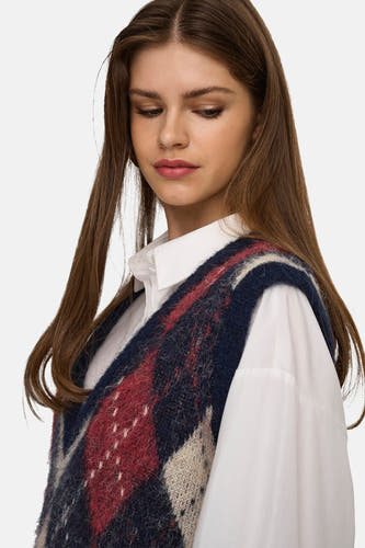 T-shirt bleu d'ONLY, avec un motif à carreaux et une chemise blanche en dessous.