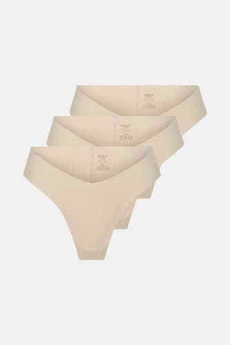 Robe d'entraînement écru ONLY®, empilée et subtilement éclairée sur un fond uni.