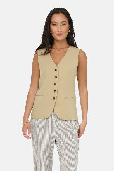 Blazer écru de JDY, avec fermeture à boutons et pantalon rayé.