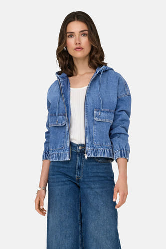 Jean jacket in mid blue denim from ONLY, with a hood, pockets, and combined with a white top and wide jeans.