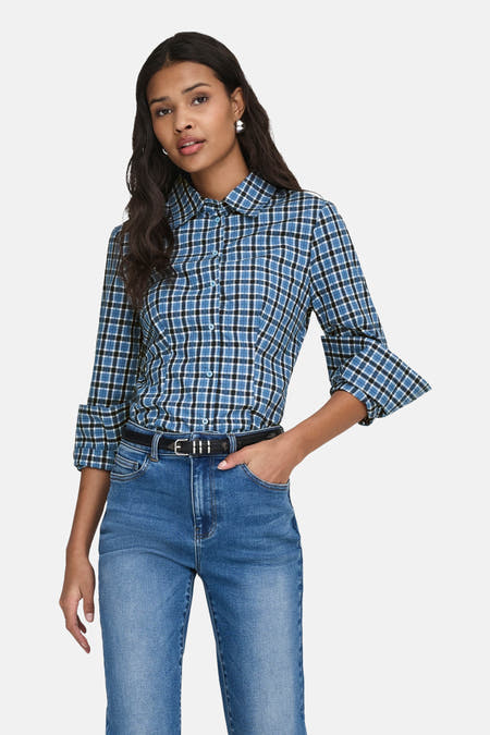 Chemise bleue à manches longues de ONLY, à imprimé à carreaux, à porter avec un jean et des bottes.