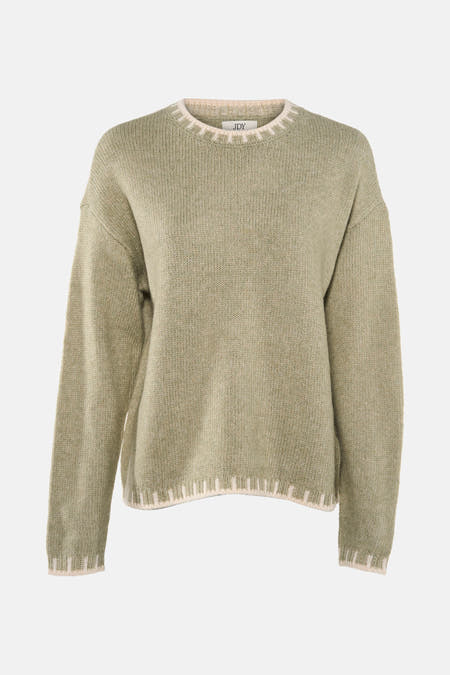 T-shirt vert avec col rond de JDY, en texture côtelée et des accents crème le long de la ligne du col et du bord.