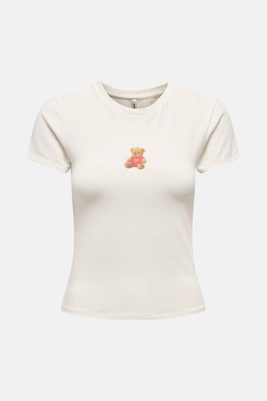 T-shirt écru à manches courtes de ONLY, avec un imprimé ours en peluche sur la poitrine.