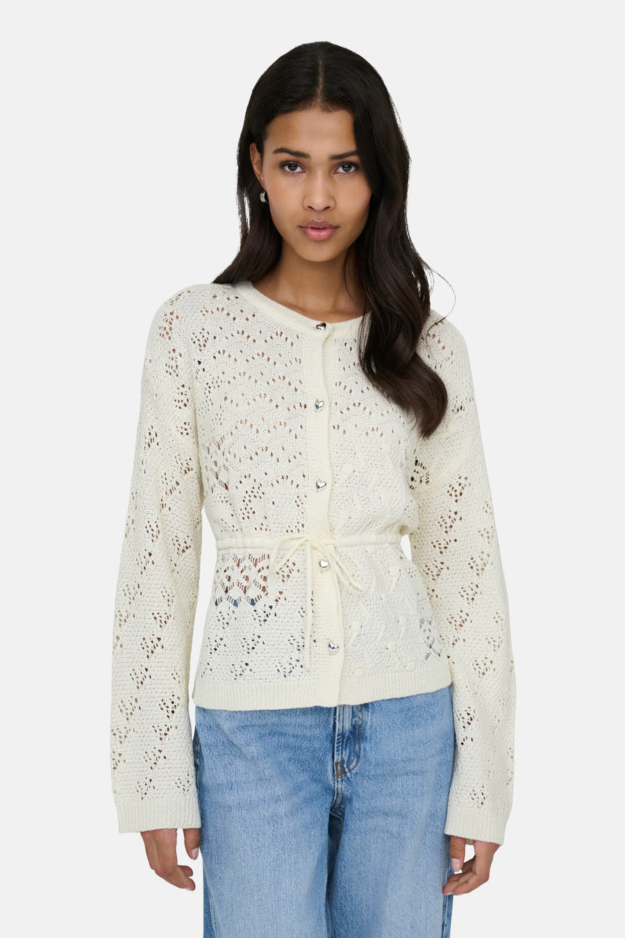 Gilet écru de ONLY, avec une encolure ouverte, des manches longues et une ceinture à nouer.