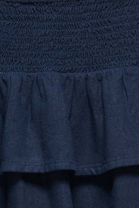 Jupe bleue ONLY® avec taille smockée et volants superposés.
