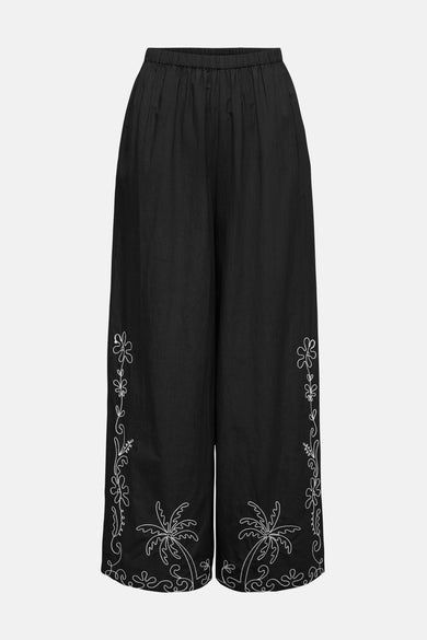 Pantalon noir de JDY, avec une ceinture élastique et une texture froissée.