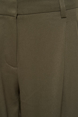 Pantalon vert ONLY®, avec ceinture élastique et poche, tissu uni.