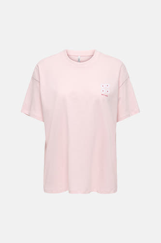 T-shirt à manches courtes rose de ONLY®, imprimé avec "KEEP GOING", des fleurs blanches à pois rouges et "KEEP GROWING" dans le dos.