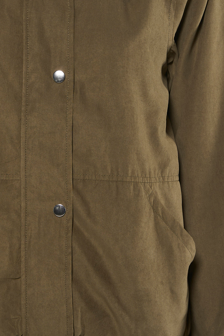 Veste courte verte de JDY, avec boutons-pression argentés et une poche latérale.
