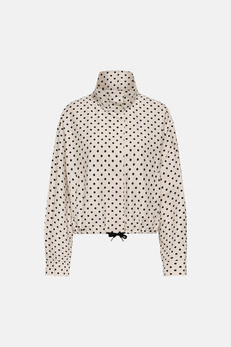 Veste courte blanche ONLY® à pois noirs, col montant et cordon de serrage à l'ourlet.