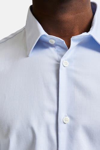 Chemise bleue à manches longues de SELECTED, avec une fermeture button-down et un col élégant.