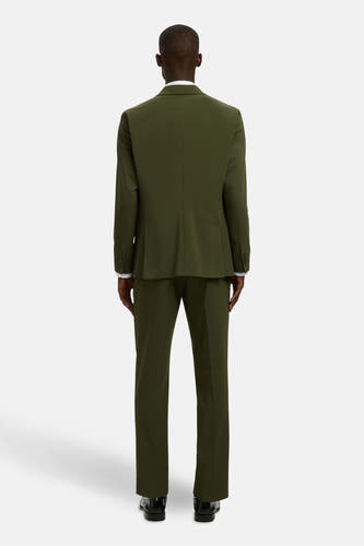 Blazer vert de SELECTED, avec deux boutons et des poches.