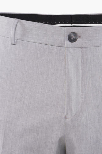 Pantalon de costume gris SELECTED, avec fermeture à boutons et subtile texture en laine.