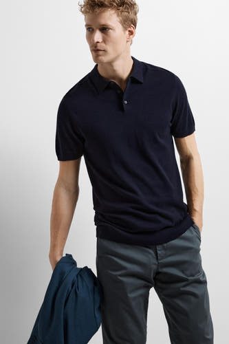 Polo bleu avec manches courtes de SELECTED, avec un design uni et une fermeture à boutons.