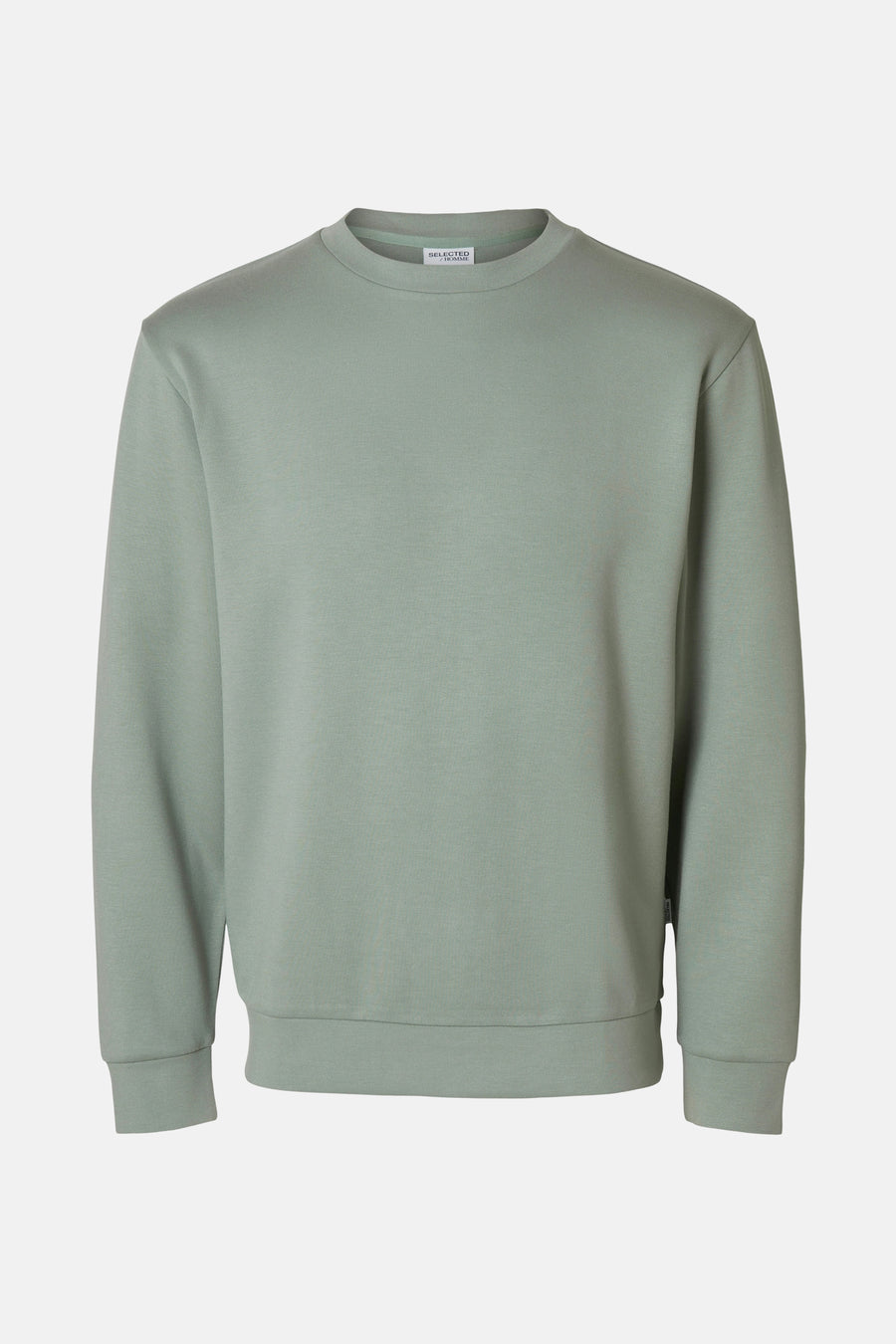 Pull vert avec col rond de SELECTED, à manches longues et poignets côtelés.