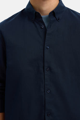 Chemise bleue à manches longues de SELECTED, design uni et fermeture boutonnée.