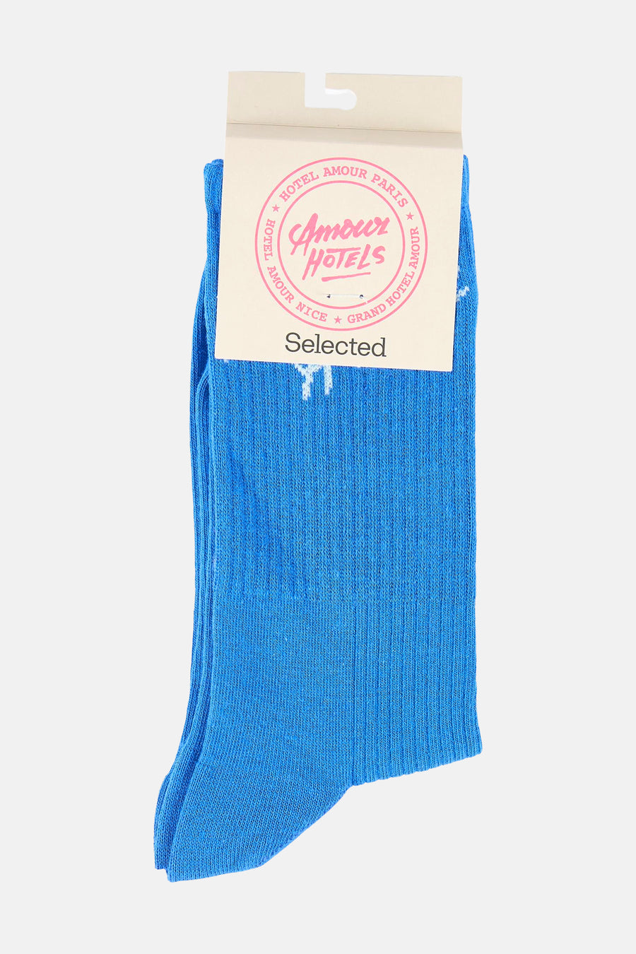 Chaussettes bleues de SELECTED, avec de fines côtes et une étiquette en papier.