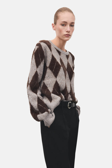 Sweat-shirt multicolore à col rond de MANGO, avec un motif à carreaux en brun et gris.