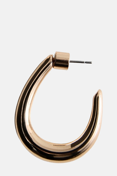 Boucle d'oreille en or de MANGO, avec une finition lisse et un petit baton pour l'oreille.