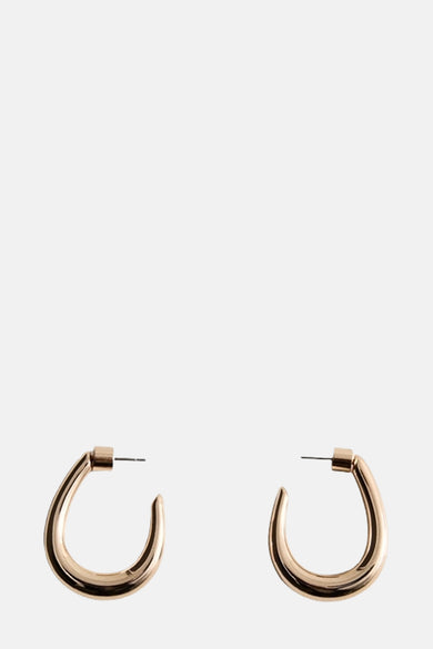 Boucles d'oreilles en or de Mango, avec un design épais et arrondi.
