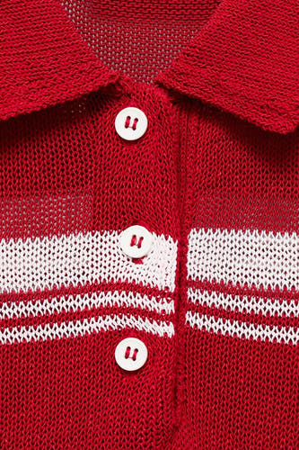Sweat-shirt multicolore à col rond de MANGO, avec fermeture à boutons et rayures horizontales.