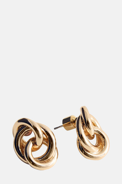 Boucles d'oreilles en or de MANGO, avec un design de chaîne tordu et une finition brillante.
