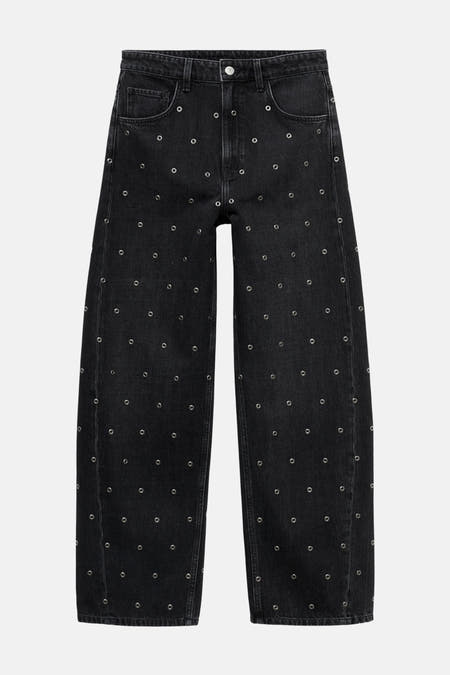 Jean denim gris foncé de MANGO, doté d'yeux argentés sur toute la surface.