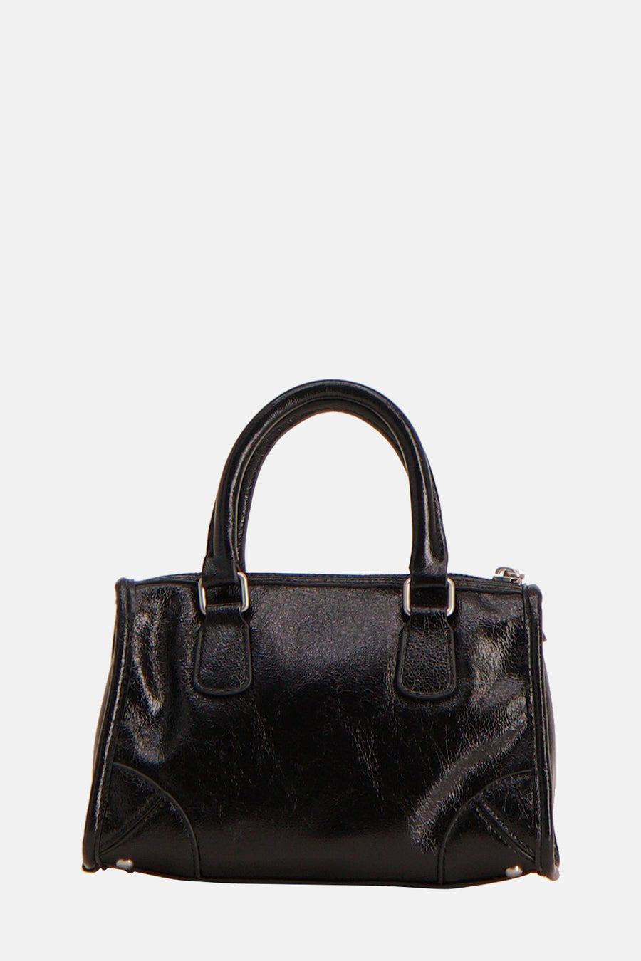 Zwarte handtas met korte handvatten.
