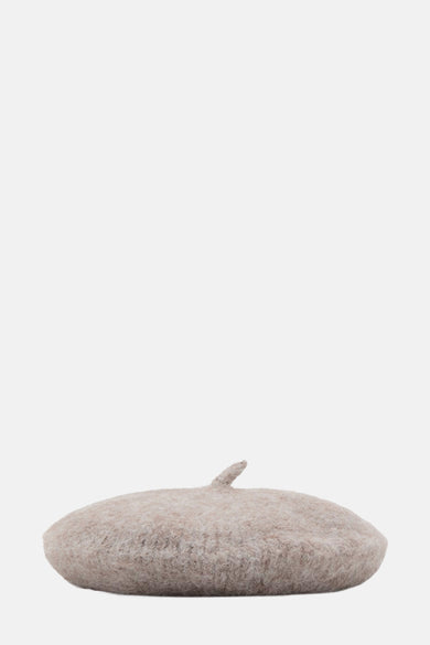 Chapeau brun de MANGO, avec une texture cotonneuse et une forme classique de béret.
