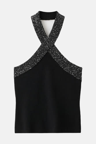 Blouse sans manches noire de MANGO, avec des bretelles croisées brillantes et une col montant.