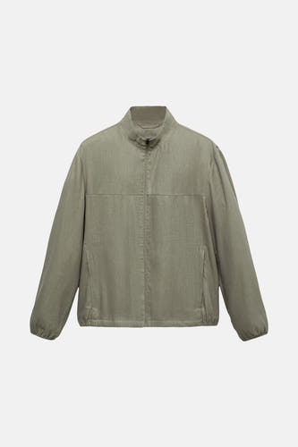 Manteau court vert de MANGO, avec fermeture à glissière et longues manches.