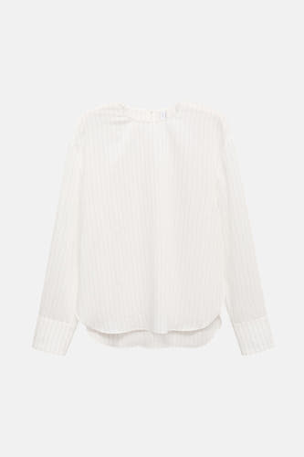 Blouse blanche à longues manches de MANGO, dotée d'un motif rayé subtil et de poignets.