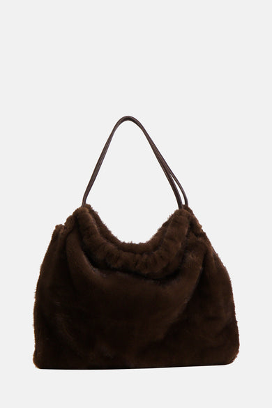 Manteau d'épaules brun de MANGO, avec une texture en fausse fourrure douce et des bretelles d'épaules fines.