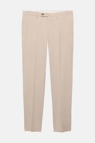 Pantalon de costume beige MANGO, avec une subtile texture et une coupe classique.