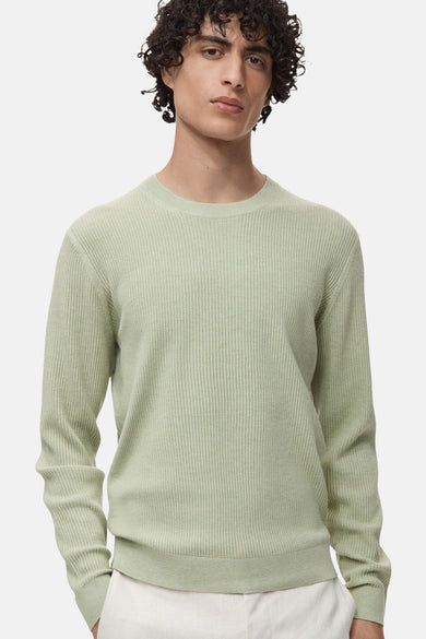 T-shirt vert avec col rond de MANGO, avec une fine structure en côtes et des manches longues.