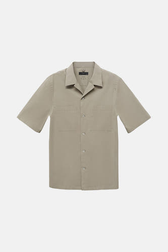 T-shirt kaki à manches courtes de MANGO, avec poches poitrine et et bouton.