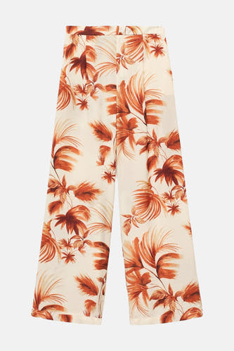 Pantalon multicolore de MANGO avec un motif de feuille tropicale.