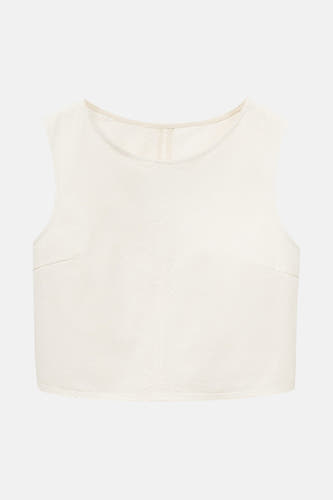 Blouse écrue sans manches de MANGO, avec un motif uni et des détails subtils.