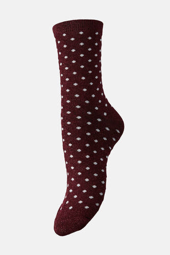 Chaussettes rouges de PIECES® avec des taches blanches et une texture scintillante.
