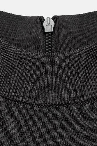Combinaison gris MANGOANGO, avec une texture texture texture texture texture et unure eninele dans le cou.